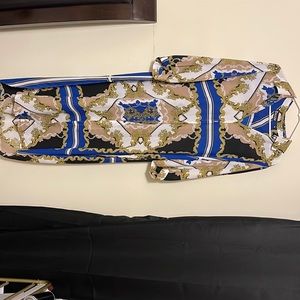 New York & Company. SIZE LARGE. Button up half sleeve. So many ways to style it!